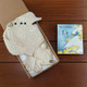 Baby Aran knitwear gift set with sweater, hat, and mittens, paired with “The Children of Lir” bedtime storybook — traditional Irish baby gift for newborns. Baby Aran knitwear gift set with sweater, hat, and mittens, paired with “The Children of Lir” bedtime storybook — traditional Irish baby gift for newborns.